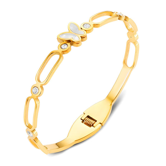 Elegant Gold Butterfly Bracelet with Mother-of-Pearl Wings and Crystal Accents